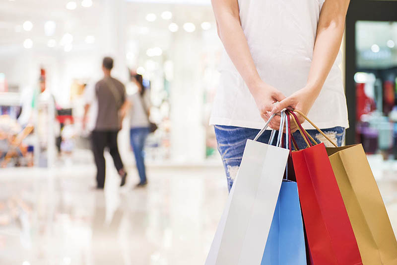 shopping bags being held